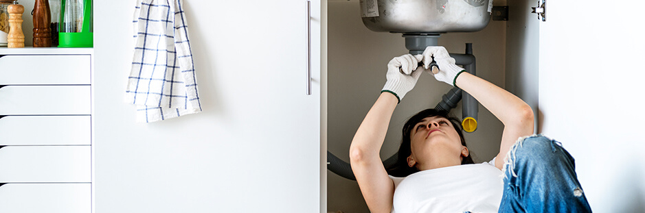 Handyman working on door